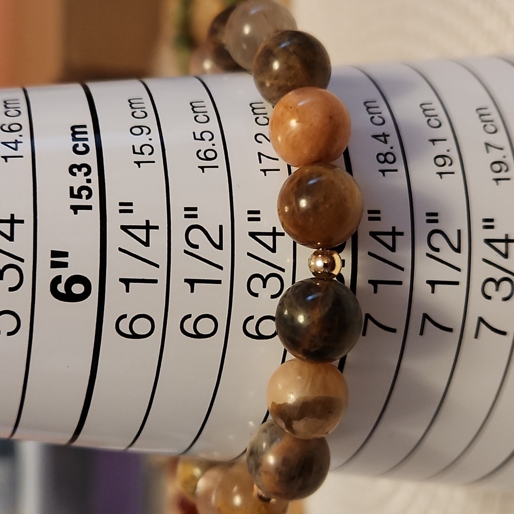 Moonstone bracelet size 6 3/4 with gold bead accents